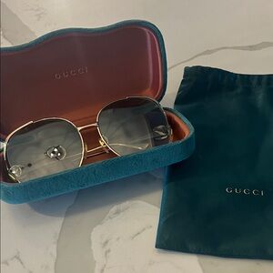 Gucci Gold-Accented Sunglasses with Teal Case